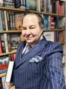Gustavo G Dolfino buys a book